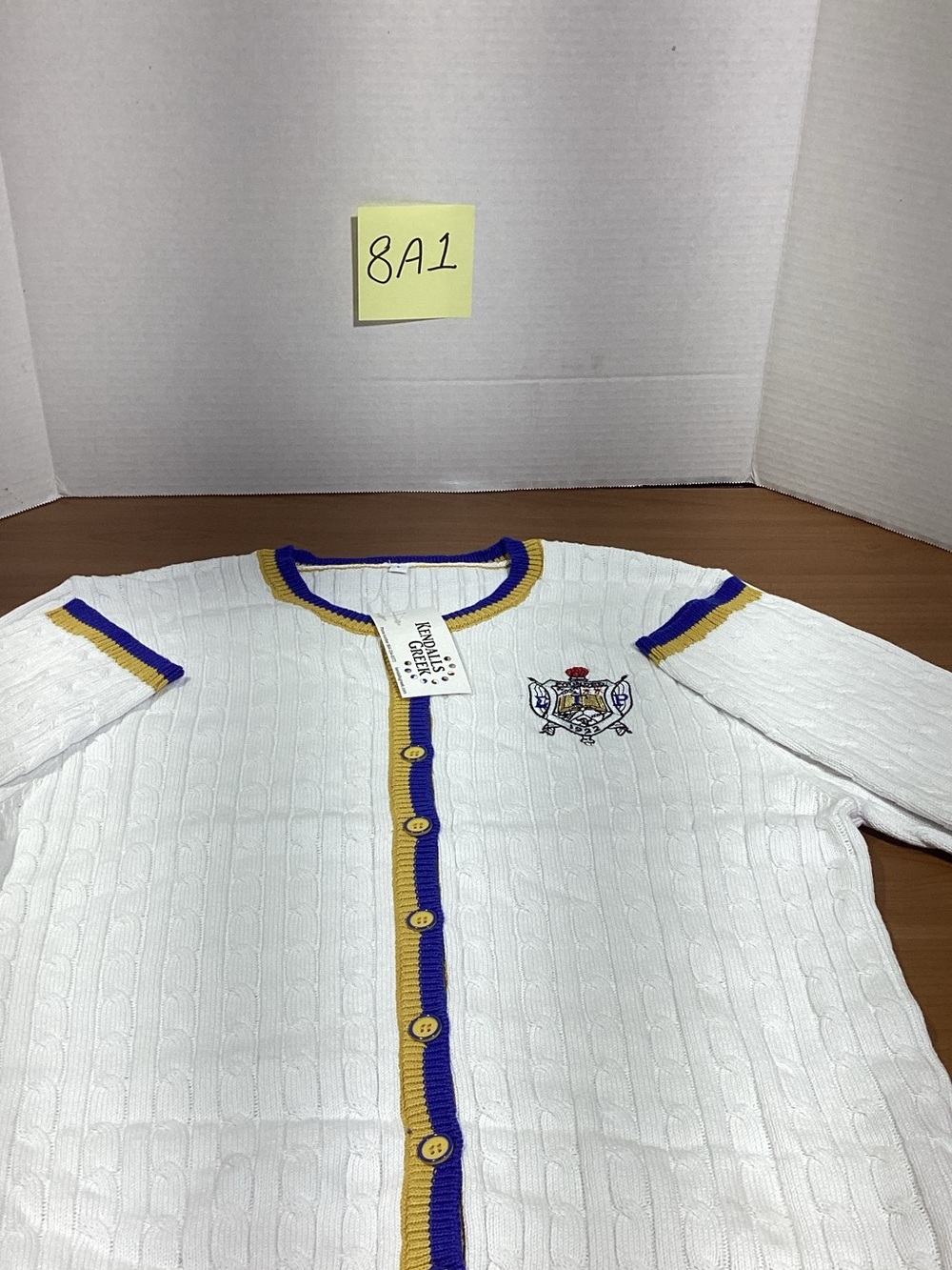 Kendall’s Greek White Knit Cardigan with Purple & Gold Trim